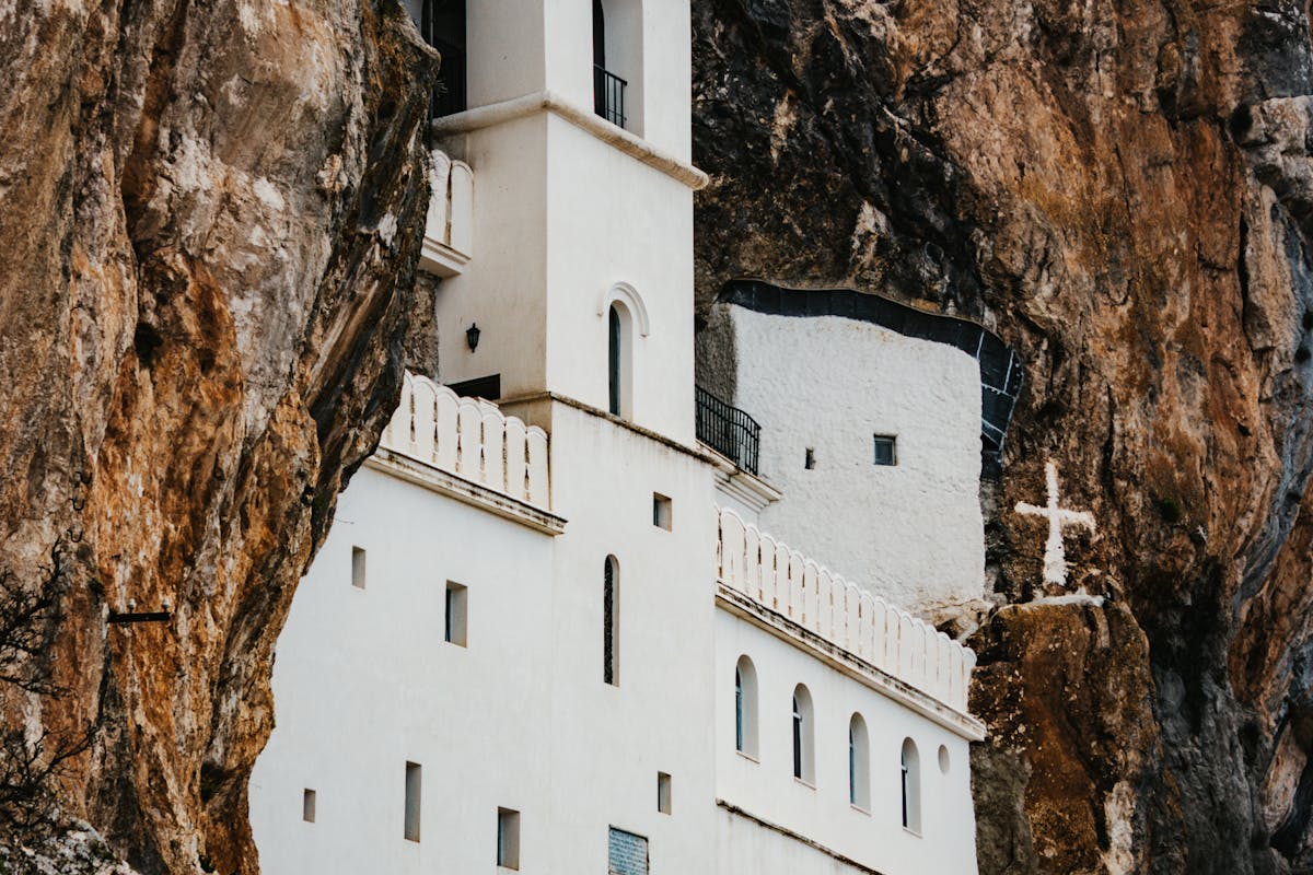 Ostrog Monastery built into the cliff face above the Zeta valley