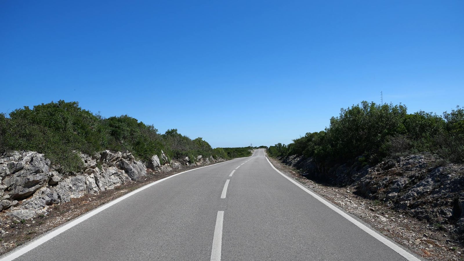 Broken inland tarmac toward Ostrog
